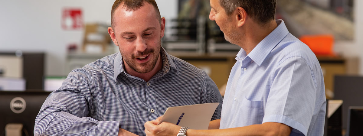 picture of men reviewing contract