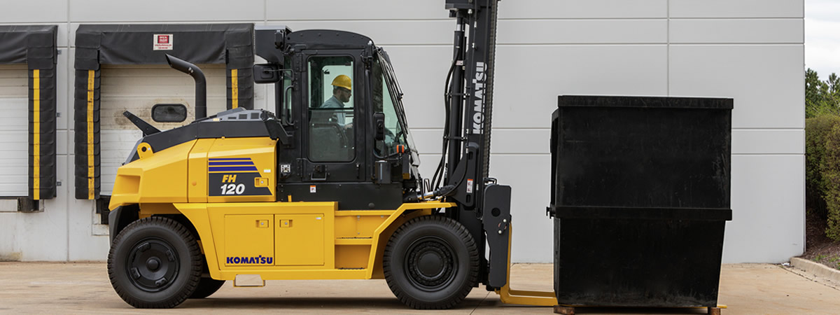 picture of forklift moving a container